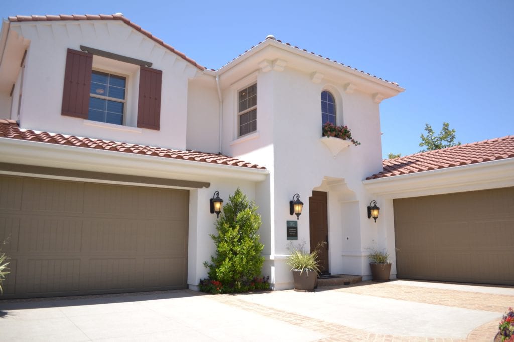 Exterior of white Mediterranean home design style.